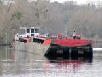 Zwei je 32,50m lange Leichter wurden am 30.01.2024 vom Schubboot  SCH 2408  (05602690 , 16,49 x 8,15m) im  TELTOWKANAL  zu Berg geschoben.