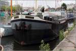 Die ENERGIE ist ein zu einem Hausboot umgebautes ehemaliges Frachtschiff. Hier liegt sie am 02.06.2014 im Floating Harbour in Bristol.